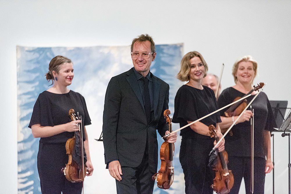 Australian Chamber Orchestra smiling on stage at TarraWarra
