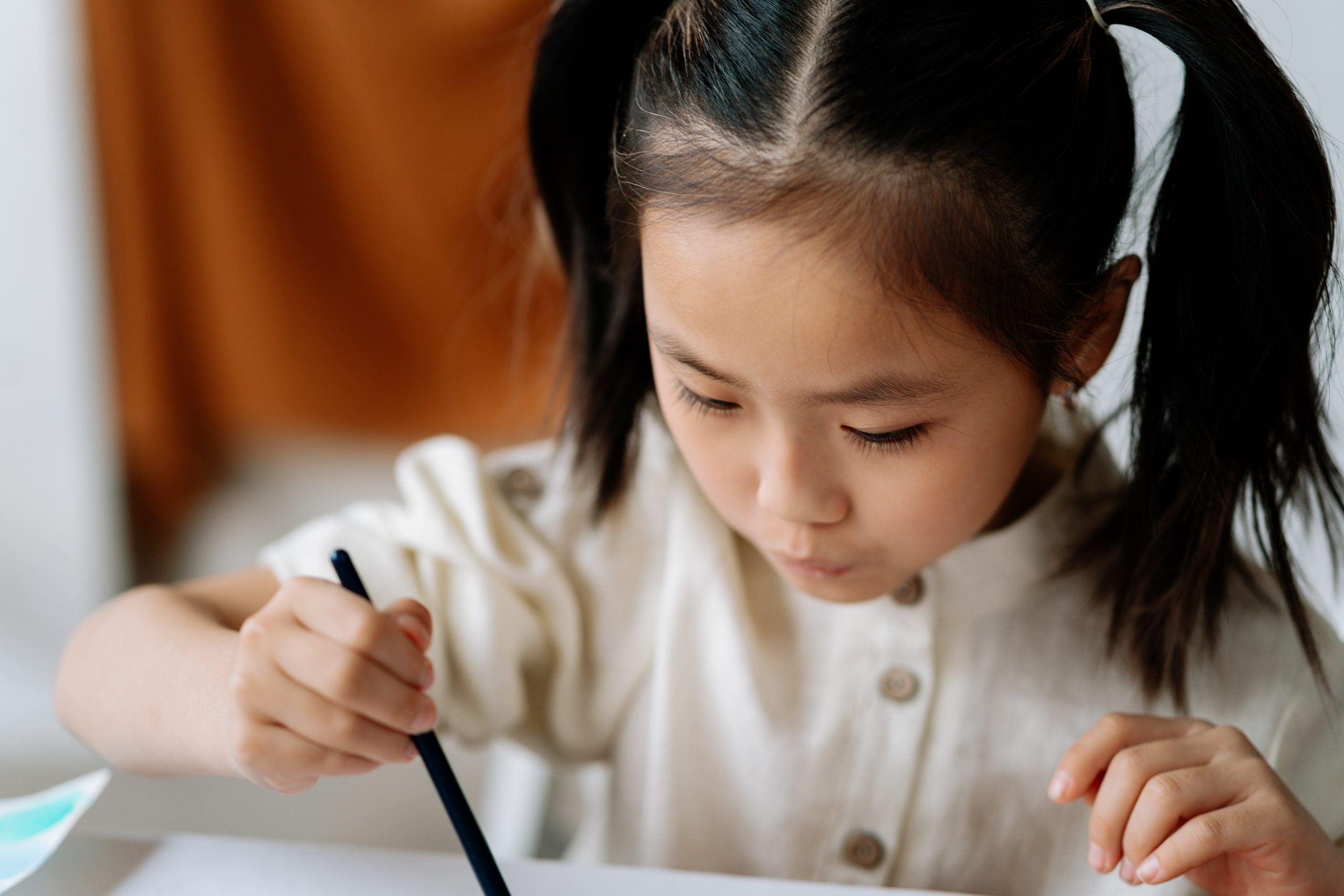 a young girl paints