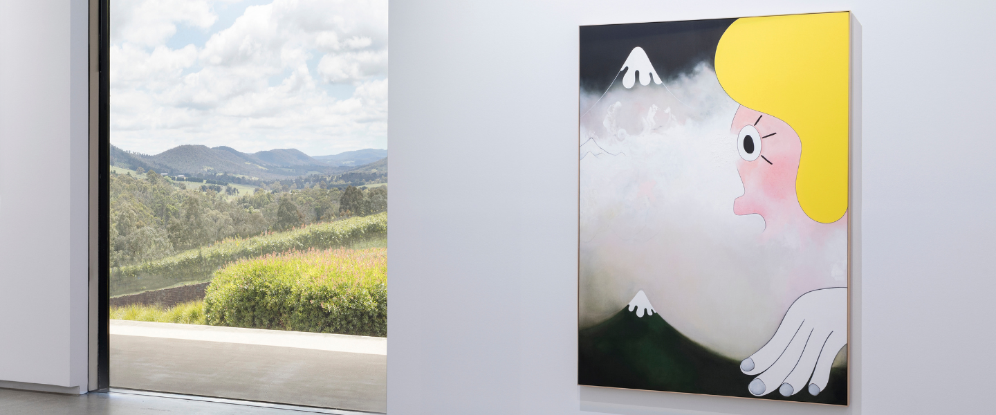 a large artwork by Brent Harris featuring a mountain next to a a large window with a mountain